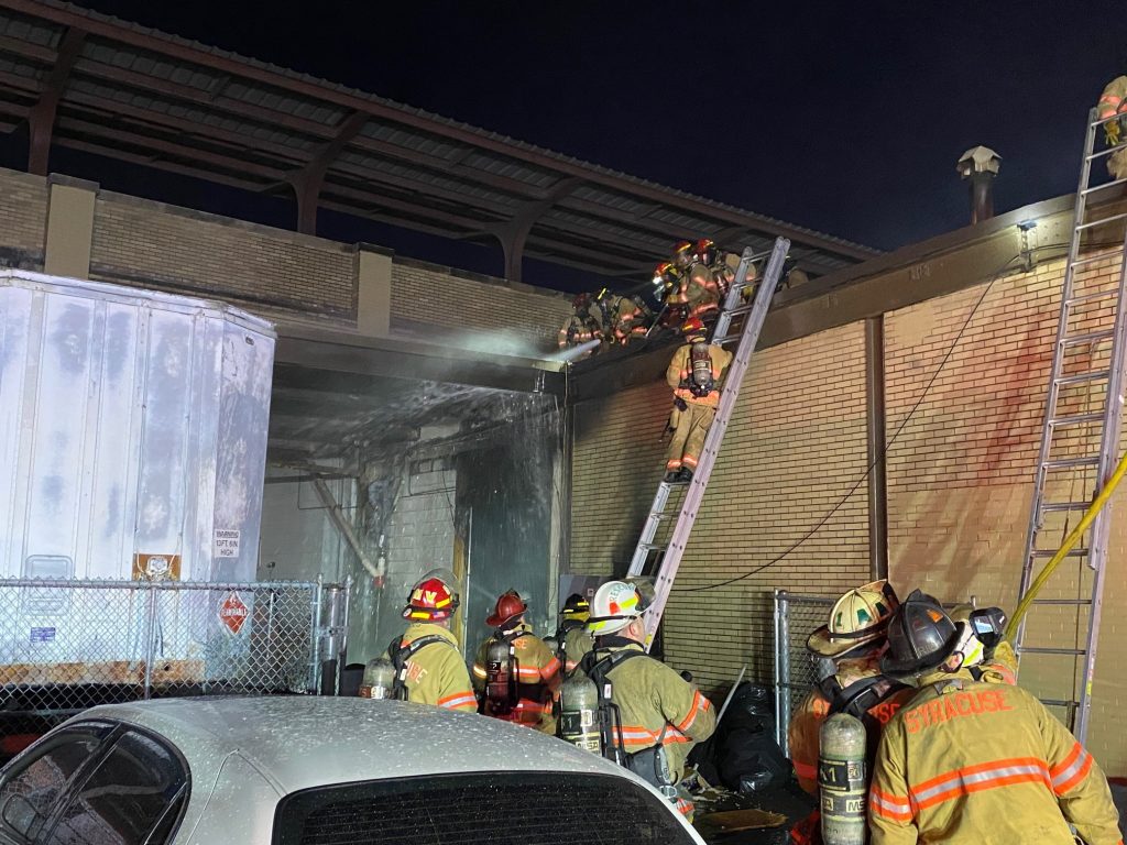 Crews stretched hose lines up ladders and undertook the labor-intensive task 